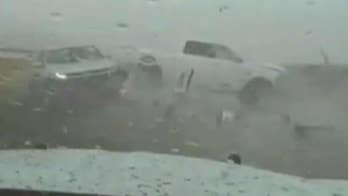 Utah police officer survives crash after truck slams into patrol car along interstate