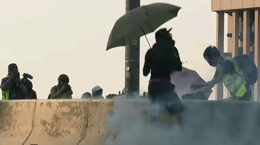 Hong Kong clashes escalate as police officer shoots protester during demonstration