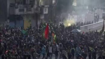 Iraq protests descend into bloodshed as activists say Iran making them 'strangers in our country'