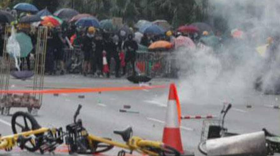 Hong Kong police shoot protester in close range