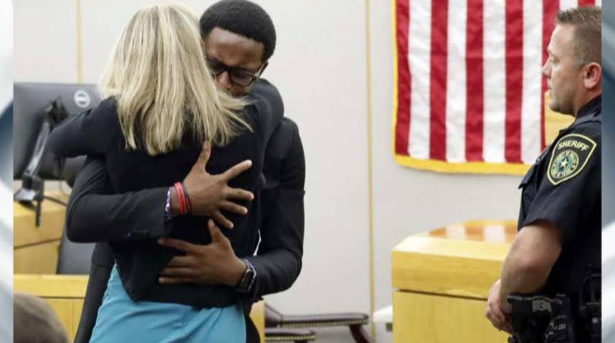 Botham Jean's brother forgives, hugs convicted murderer Amber Guyger