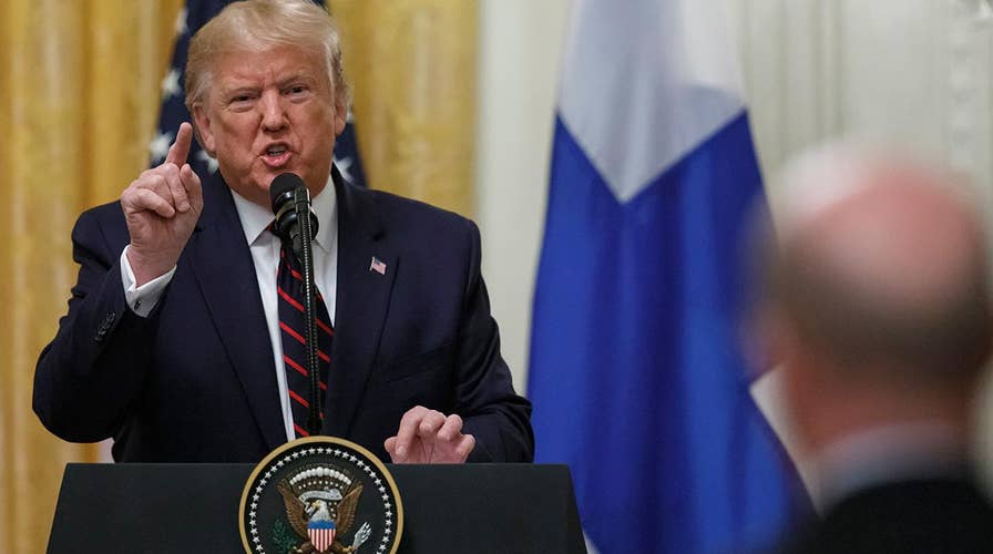 President Trump clashes with media over impeachment