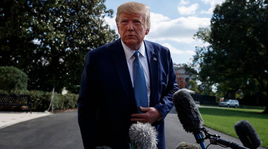 Trump openly urges Biden probe