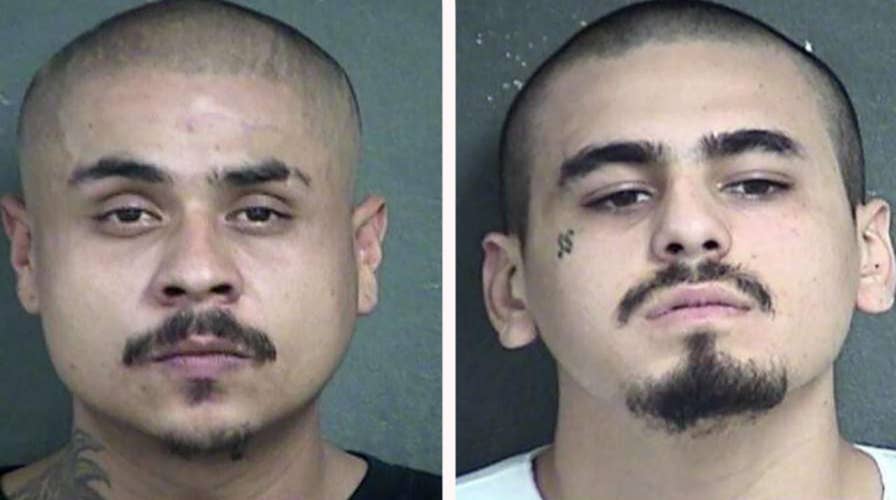 Kansas City bar shooting suspect in custody, second remains at large