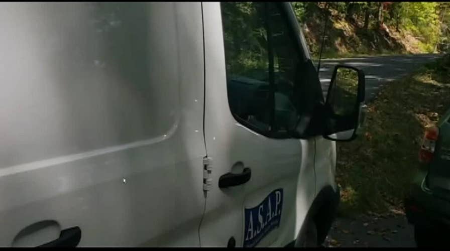 Bear cubs stuck in van freed after honking horn