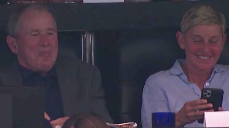 Ellen DeGeneres defends sitting with former President George W. Bush at football game