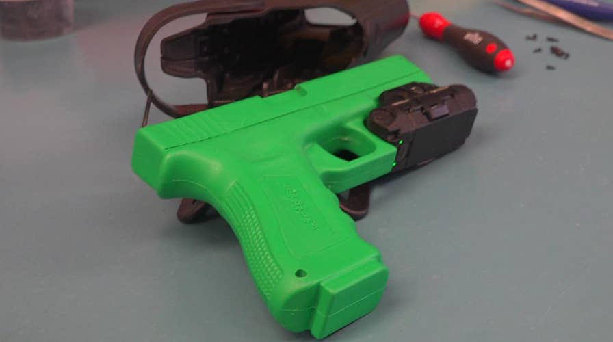 Police departments invest in gun cameras