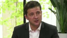 Zelensky rips US aid delay, but says he never discussed quid pro quo with Trump