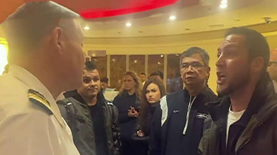 Angry cruise ship passengers yell at crewmembers, demand refunds