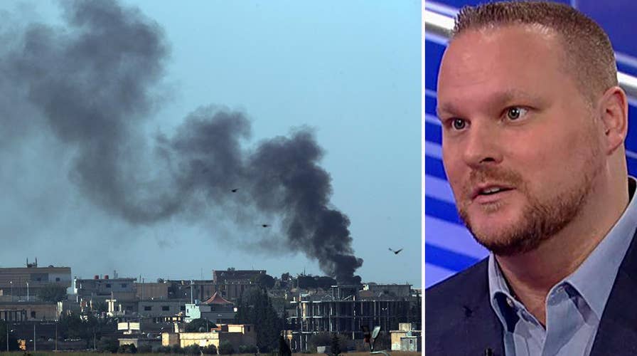 Fears grow that nearly 11,000 imprisoned ISIS fighters could escape as Turkey invades Syria