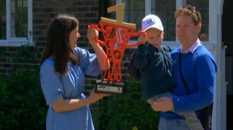 Formula 1 champ sends race car to terminally ill kid