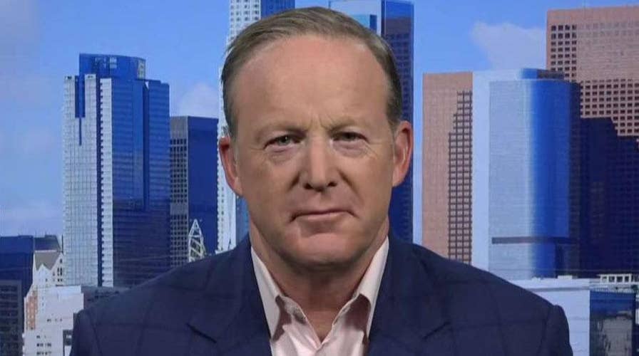 Trump says media siding with Dems