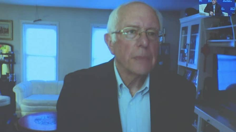 Watch: Sanders doesn't let ringing phone interrupt answer during union town hall