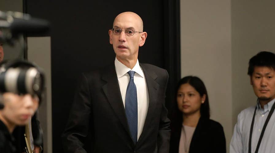 Media dunk NBA over China