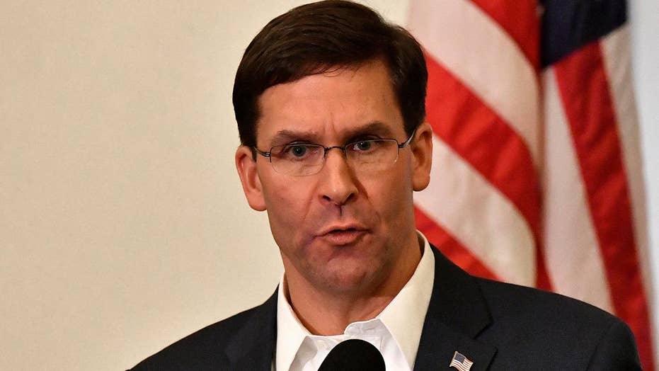 Defense secretary defends decision to pull US troops from Syria