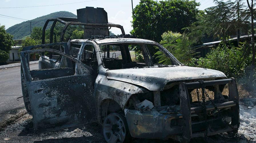 Mexican cartel ambushes police convoy, kills 13 officers