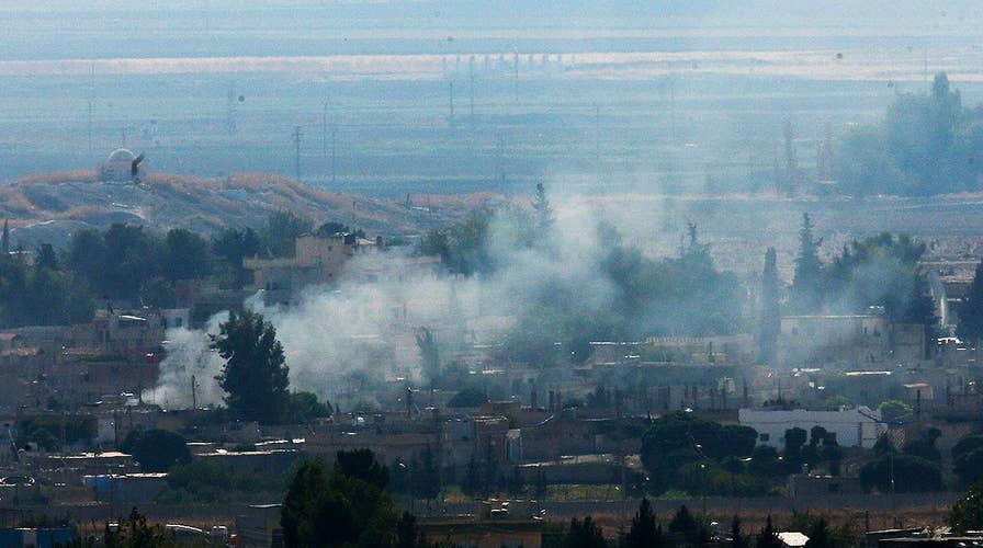 Shelling and smoke reported near Syria-Turkey border