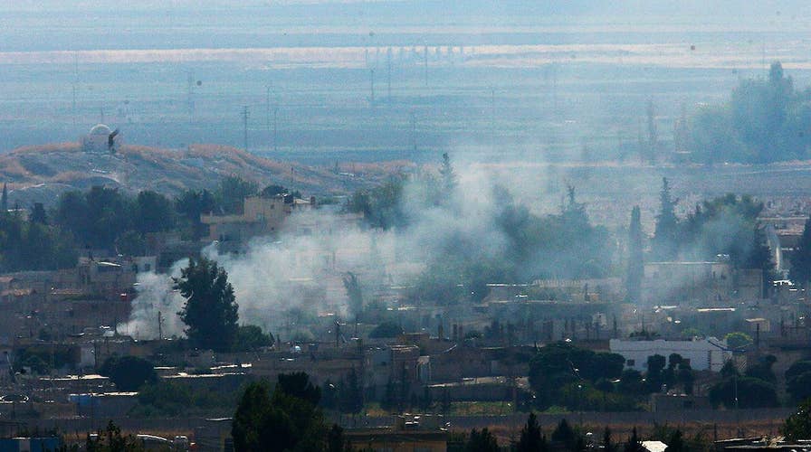 Shelling and smoke reported near Syria-Turkey border