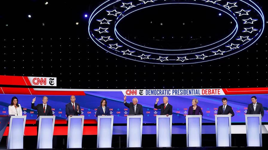 Impeachment inquiry overshadows Democratic presidential debate