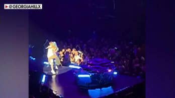 Lady Gaga falls off stage during concert