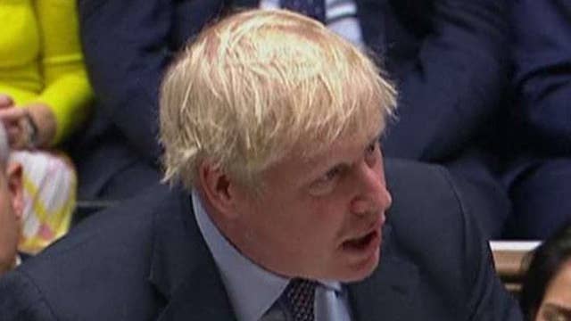 UK parliament votes to postpone Brexit vote