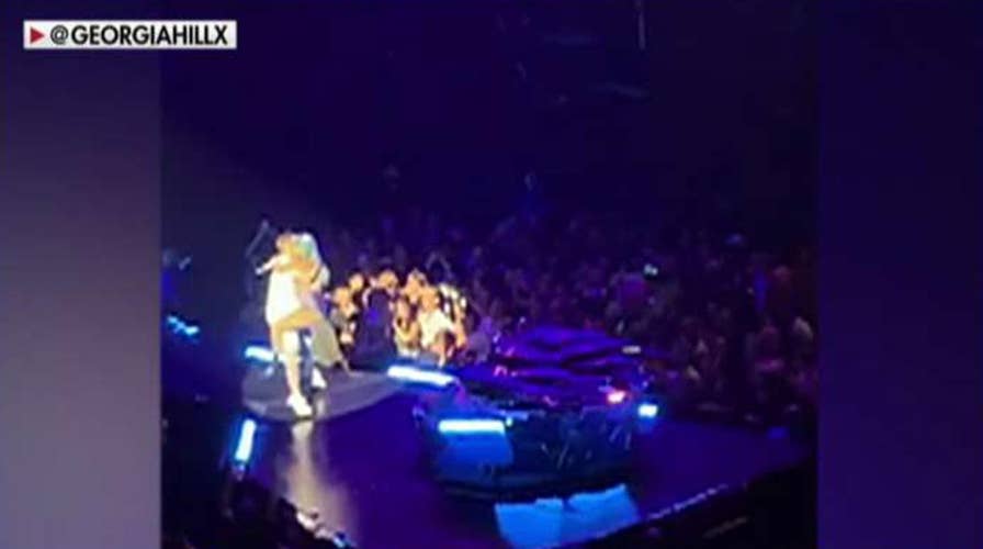 Lady Gaga falls off stage during concert