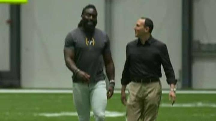 Demario Davis explains what he's doing with the money he got from the 'Man of God' headband sales