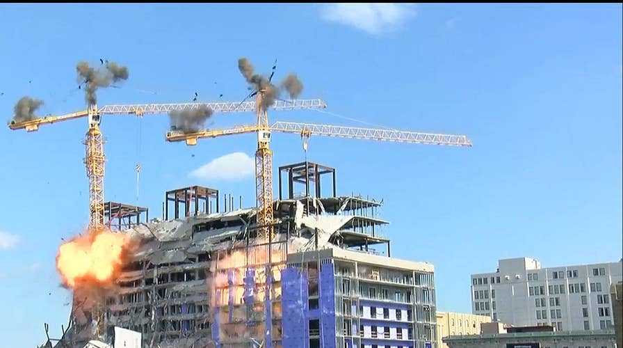 Implosion of unstable cranes at NOLA Hard Rock collapse site
