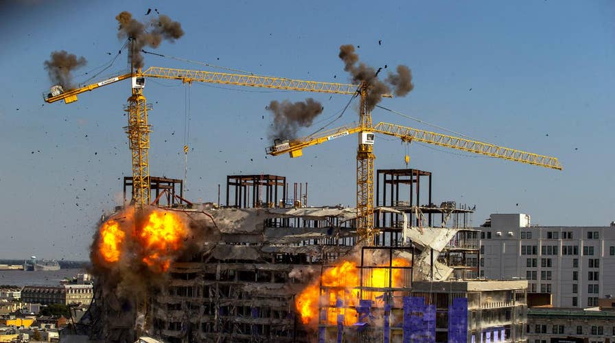 Controlled demolition takes place at New Orleans construction site