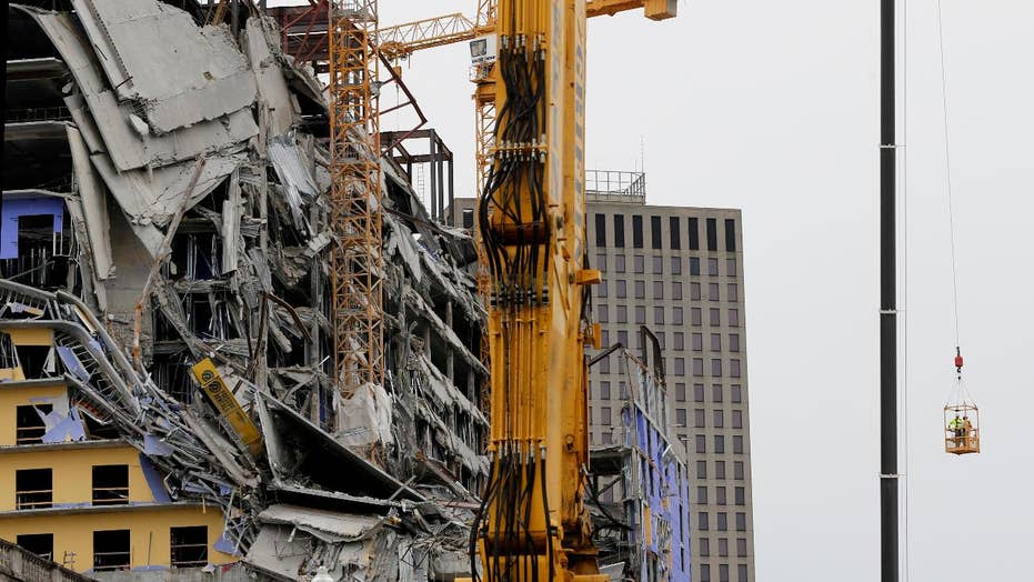 New Orleans Implodes Damaged Cranes On Partially Collapsed
