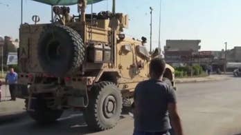 Iraq's military says US troops leaving Syria don't have permission to stay in country