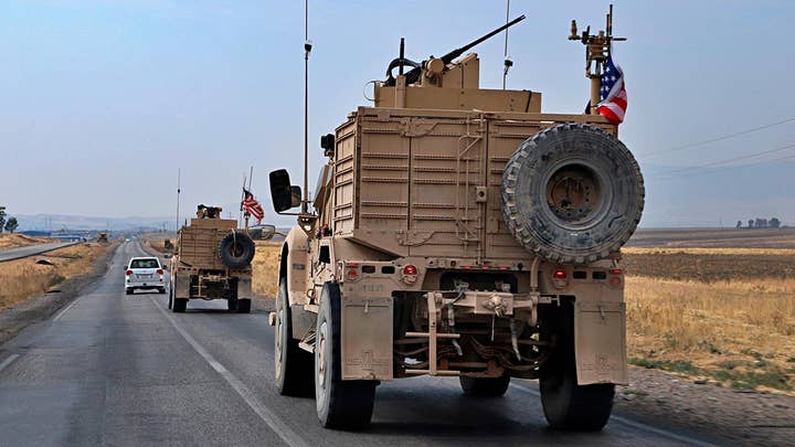 Defense official: All US armored vehicles evacuating northeast Syria have arrived in Iraq