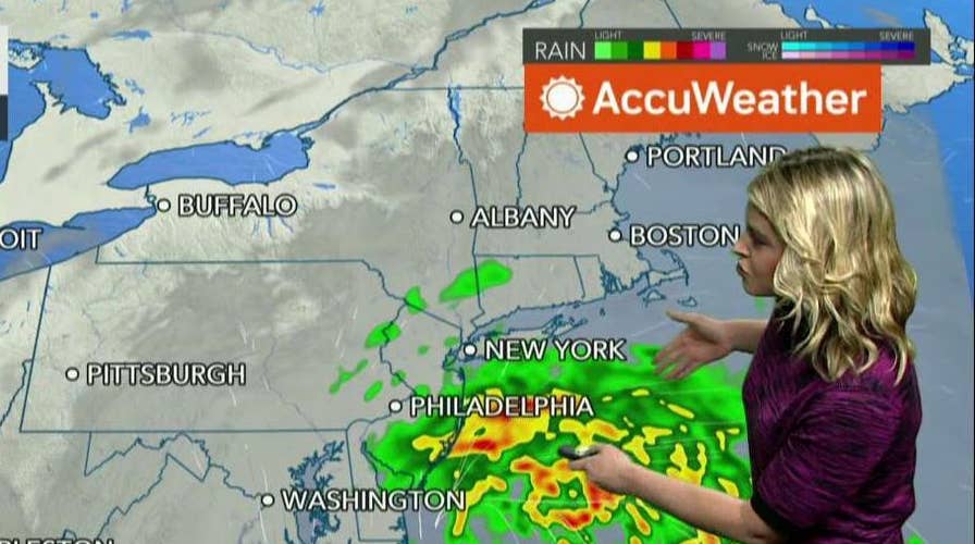 Nestor spreads north, hits East Coast with rain