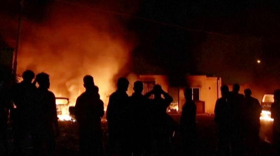 Rioting migrants set several cars on fire and injured a policeman at a Malta holding center