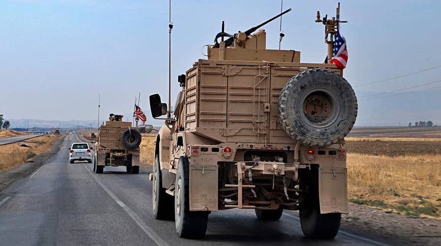 Defense official: All US armored vehicles evacuating northeast Syria have arrived in Iraq