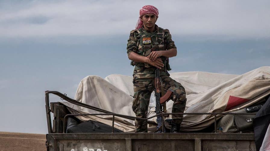 Iraqi military says US troops who were in Syria do not have permission to stay in Iraq