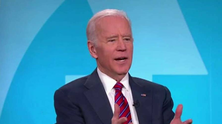 Biden drops opposition to super PAC fundraising