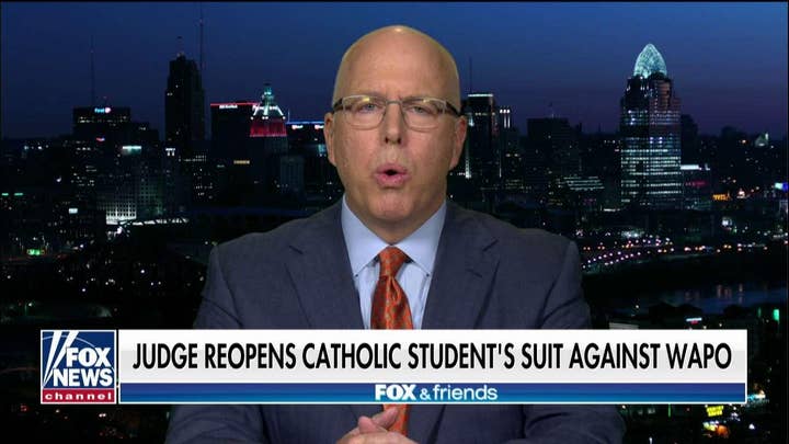 Nicholas Sandmann's attorney reacts after a judge reopens their case against The Washington Post