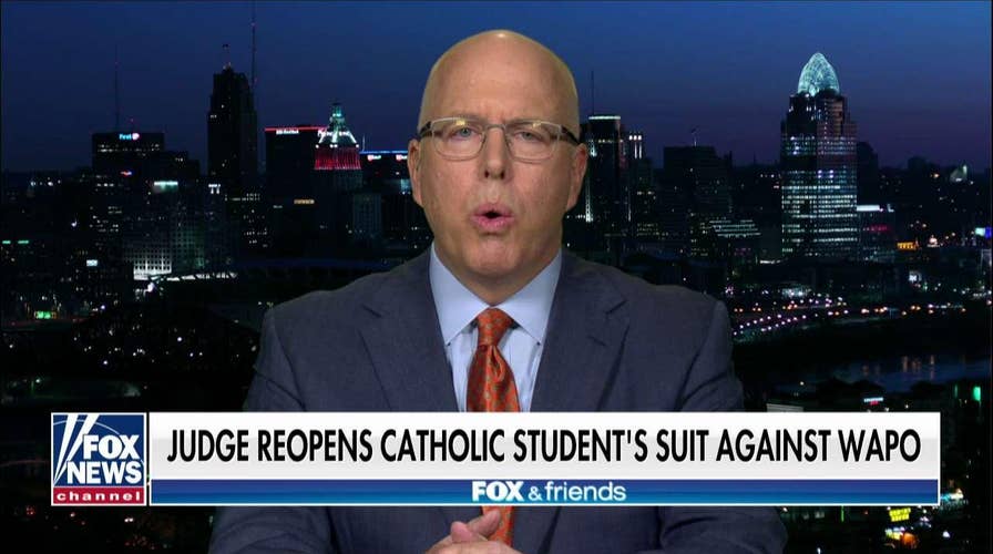 Nicholas Sandmann's attorney reacts after a judge reopens their case against The Washington Post