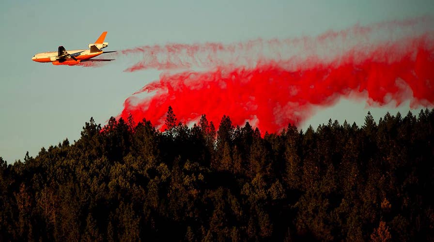 California utility companies shut off power as fires rage