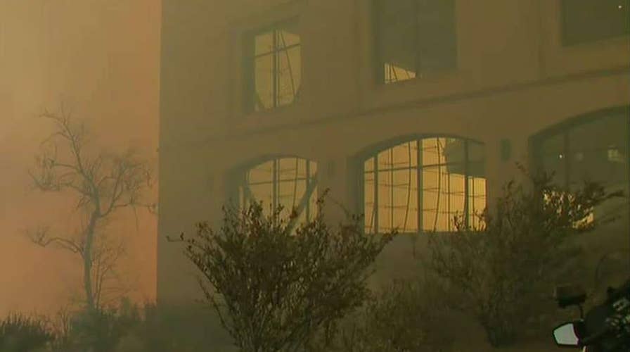 Staffers shelter in place at Reagan Presidential Library as fast-moving wildfire burns in Simi Valley