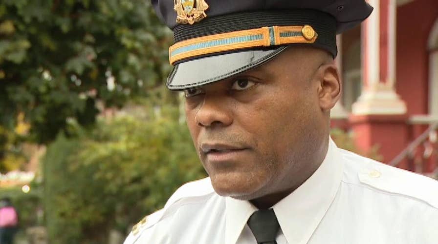 Philadelphia police captain talks to the media after a family was found dead in their home
