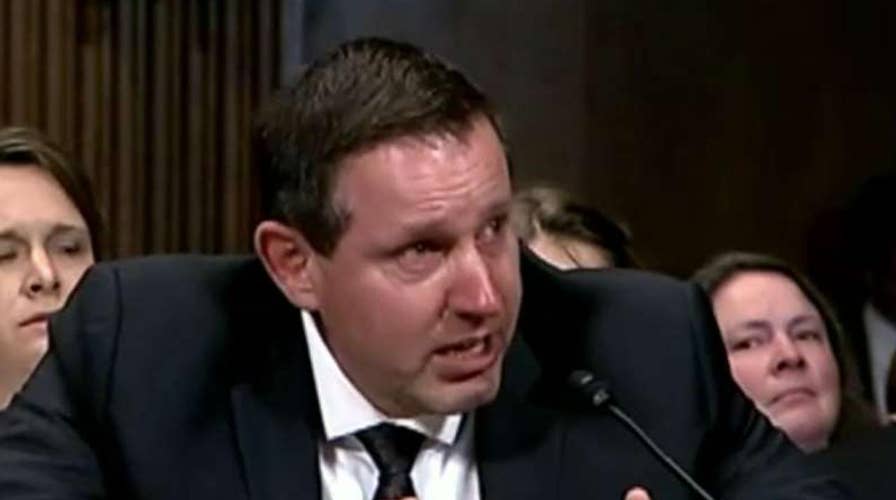 Trump Judicial pick breaks down in tears at hearing