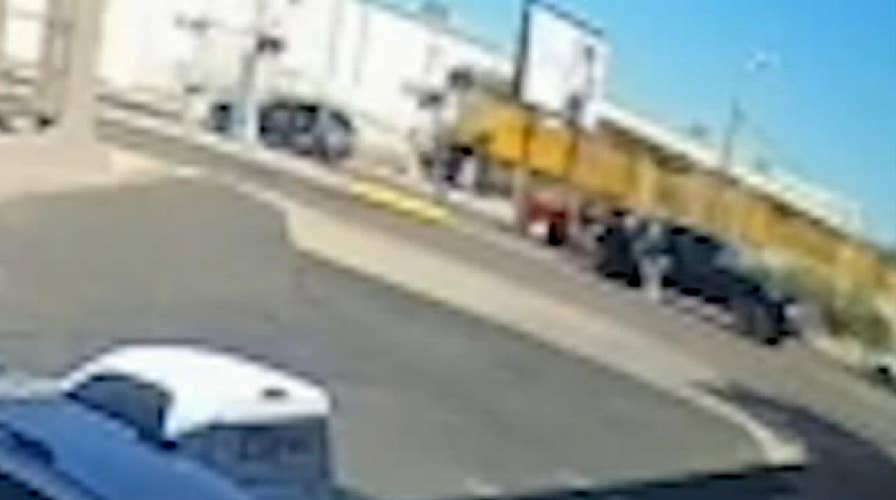 Woman pulled from vehicle moments before it was hit by a train in Arizona