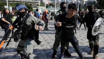 Pro-democracy protester shot at close range as violence escalates in Hong Kong