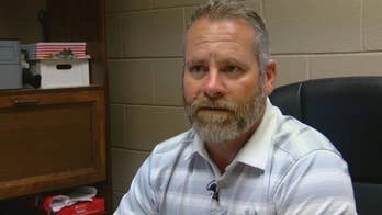 Oklahoma cop accused of murdering police chief apparently found 'mumbling,' sitting on top of chief's body