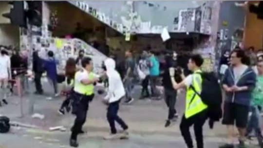 Hong Kong police harden response to pro-democracy protests