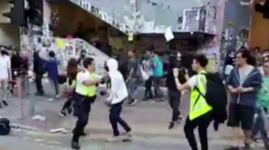 Hong Kong police harden response to pro-democracy protests