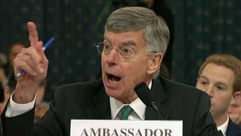 Career diplomats withstand grilling at partisan impeachment hearing