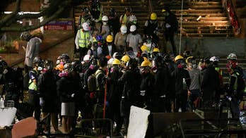 Tensions between Hong Kong police and protesters escalates